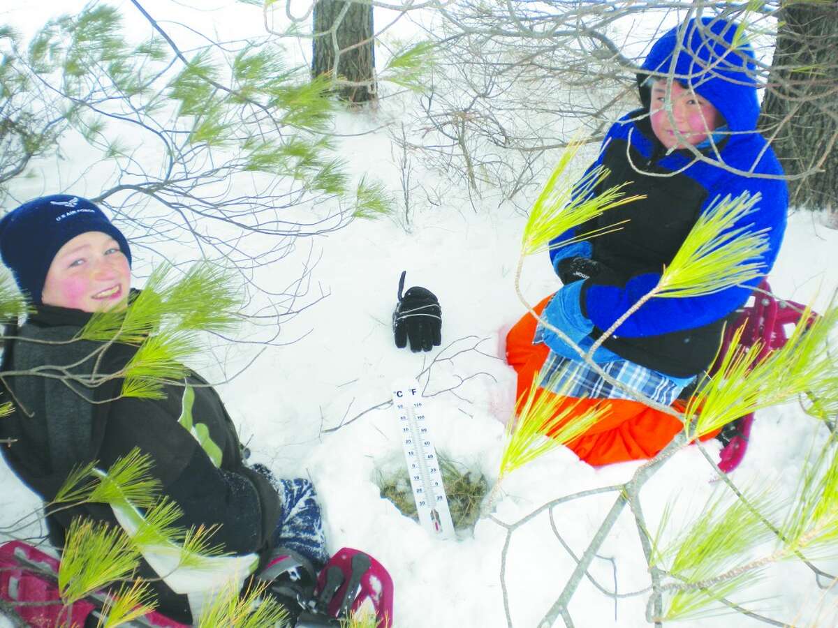 Snow Shoe Students: Two Frankfort students, Josh Grose on left and Michael Mendoza, enjoying the snow shoe hike field trip. (Photos/Ryan Jarosz)