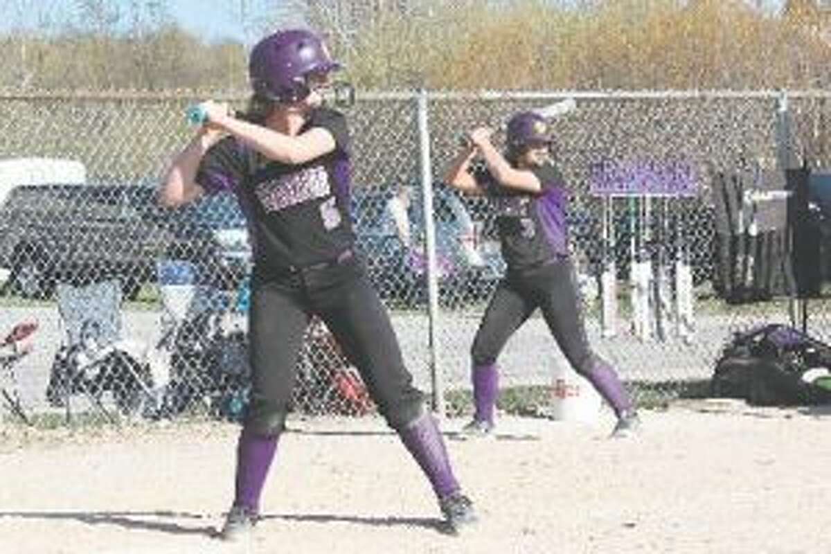 First team all-state shortstop Haley Myers waits on a pitch, while honorable mention all-state second baseman Bre Dawe waits on deck. (File photo)