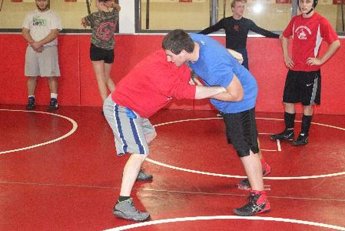 READY TO HIT THE MAT: Benzie Central wrestlers practice on the mat as they get ready for the quickly approaching start to the season.