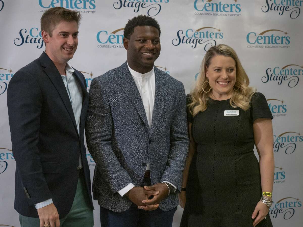 LaDainian Tomlinson takes a picture with William and Anne Reese 08/15/19 at the 19th annual Centers Stage presents an Evening with LaDainian Tomlinson. Tim Fischer/Reporter-Telegram