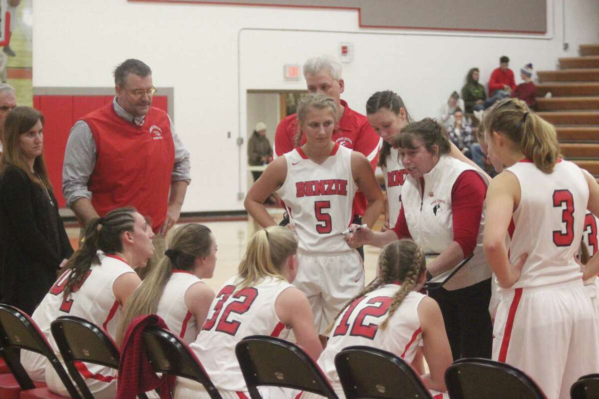 Benzie Central coach Sarah Ross coaches her team during a timeout. (Photo/Robert Myers)