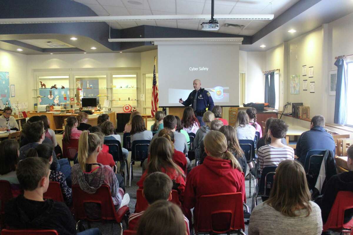 State Police Trooper Dave Prichard talks to Frankfort Elementary sixth grade students about cyber safety. (Photo/Robert Myers)