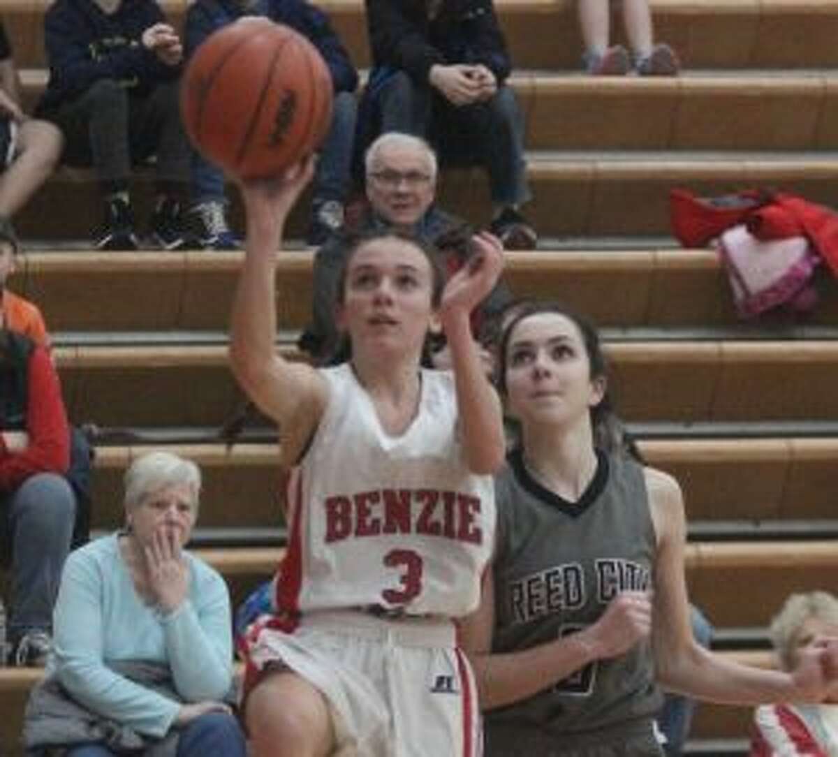 Benzie Central's Cierra Guay gets a layoff to fall just before the buzzer. (Photo/Robert Myers)