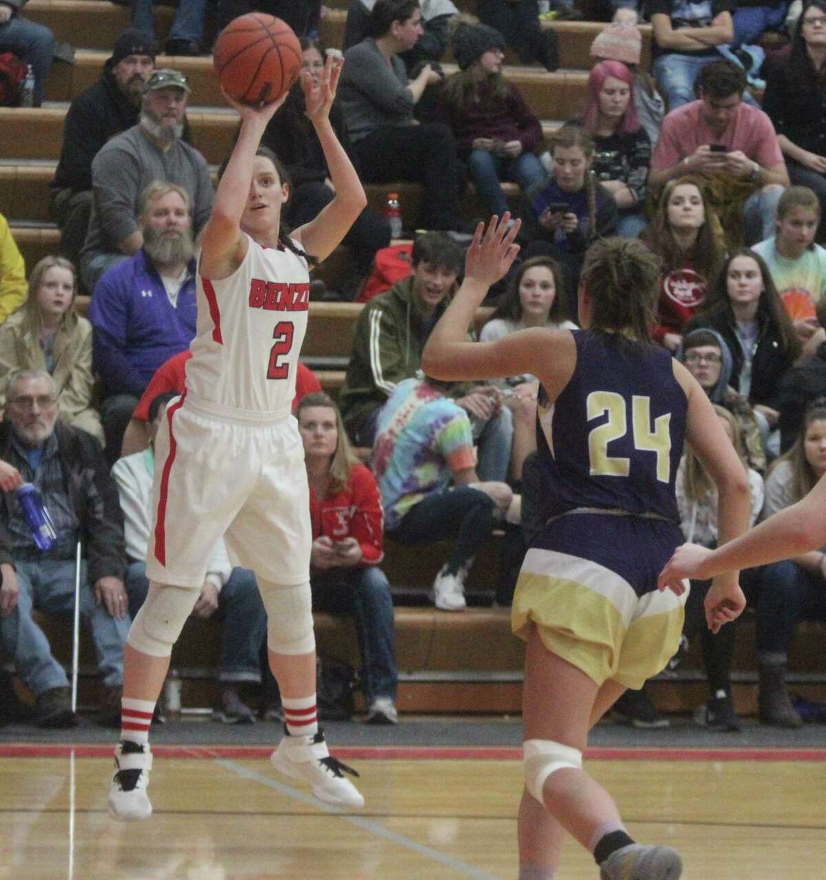 Abby Bretzke shoots a three from the corner, as she leads her team to victory over Frankfort. (File photo)