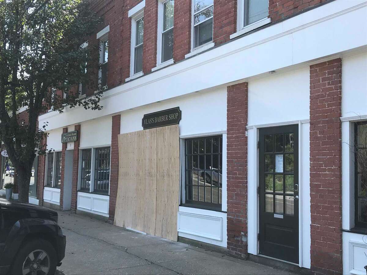 PHOTOS Vehicle runs into the front of Tokeneke Road barber shop in Darien