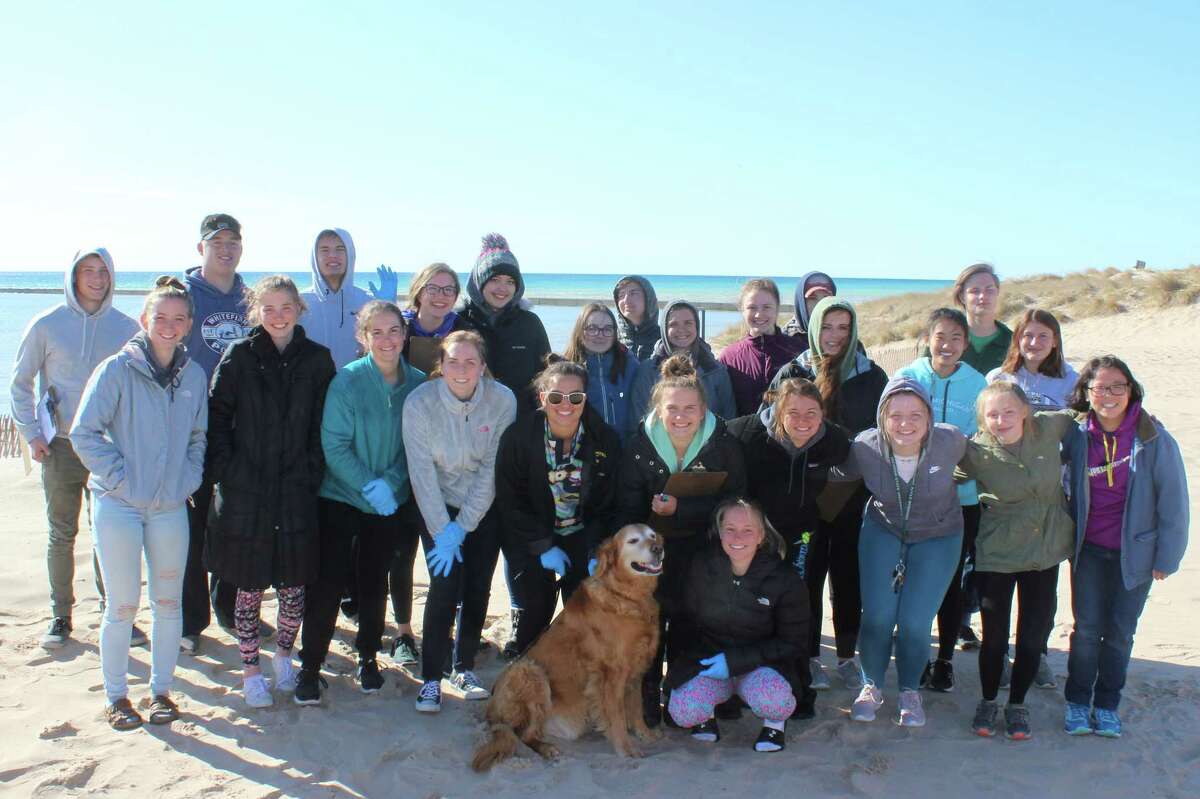 Frankfort High School National Honor Society members gather to cleanup Frankfort Beach. (Photo/Robert Myers)