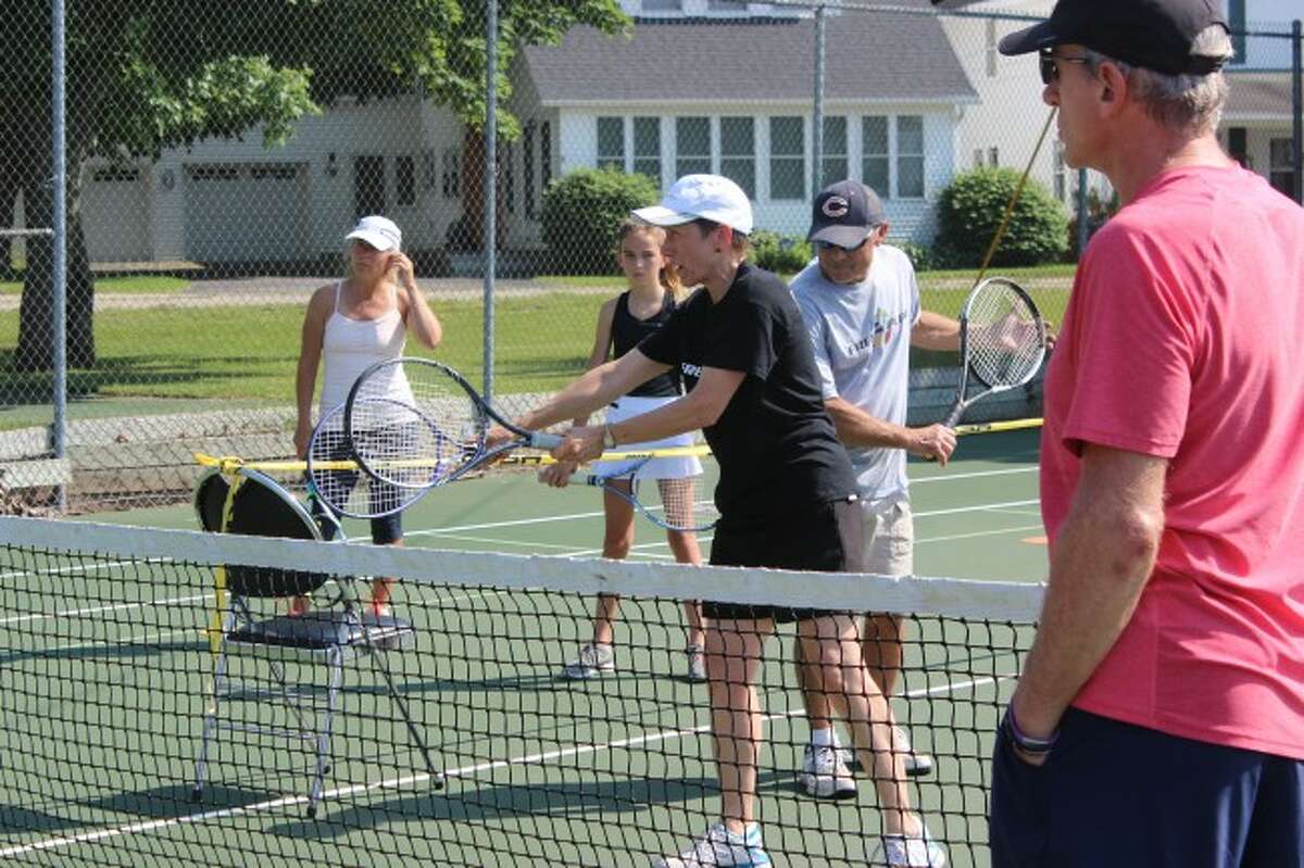 Barb Skurdall leads the tennis lesson at Beulah throughout the summer.
