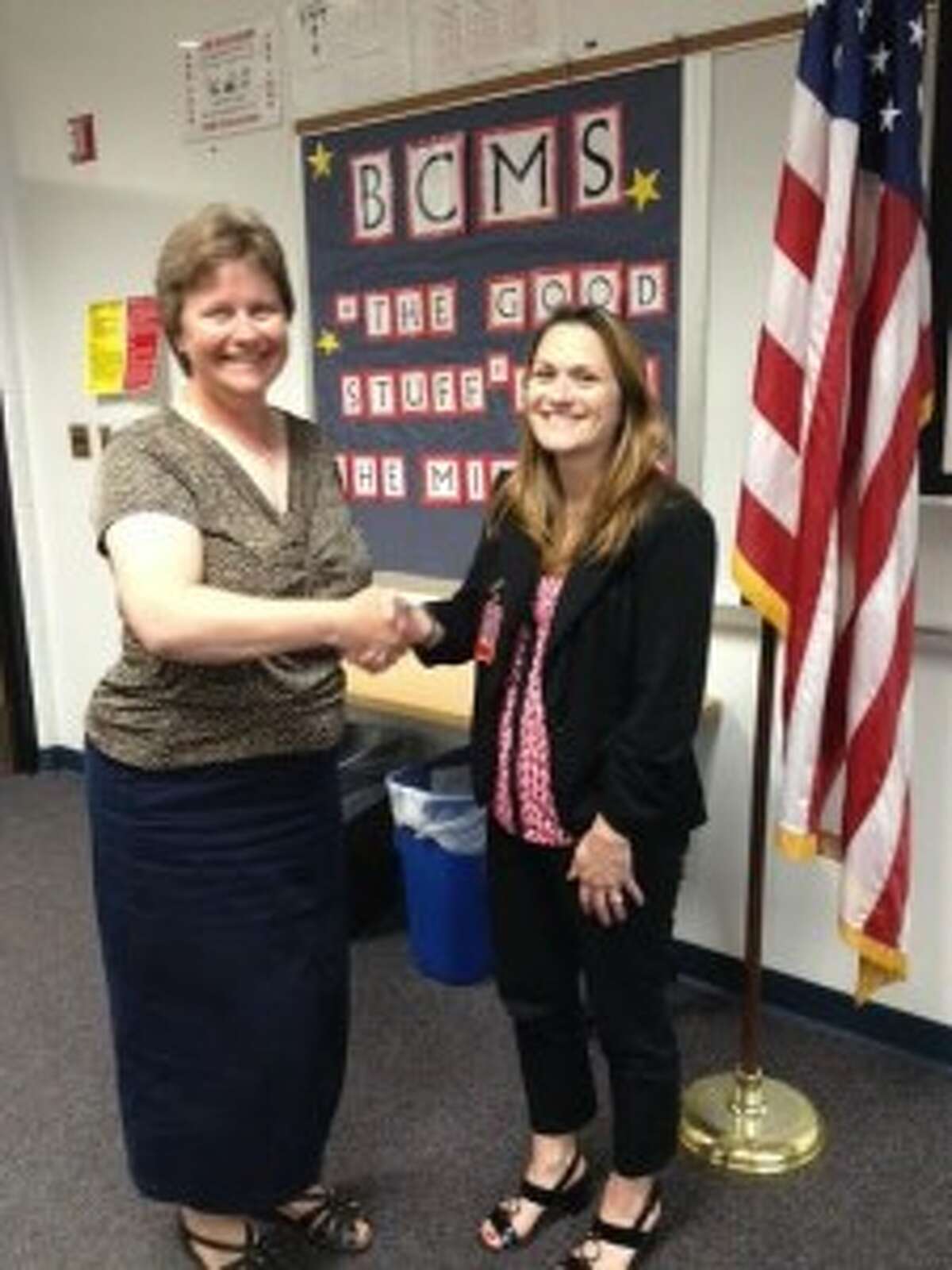 WELCOME ABOARD: Benzie Central School Board President Lorraine Nordbeck shakes hands with Amiee Erfourth, the newly appointed Betsie Valley Elementary School principal. (Courtesy photo)