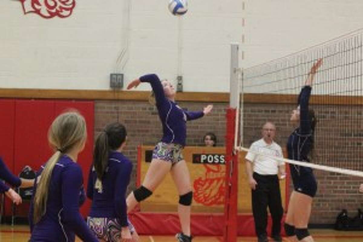 KEEP YOUR EYE ON THE BALL: Frankfort senior Madison Stefanski goes up for the spike during the Panthers' match against Manistee HS at Suttons Bay.