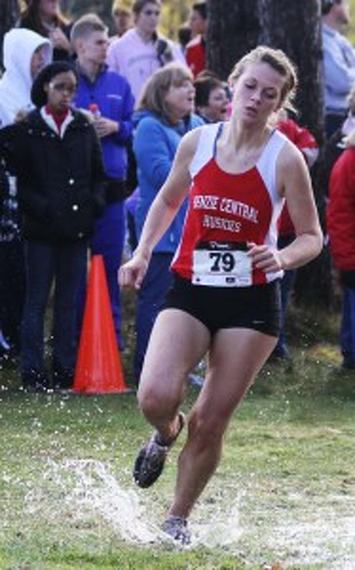 NOT SLOWING DOWN: Mary Warsecke soldiers through the rough race conditions to help the Huskies win the day.