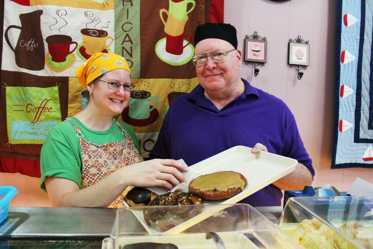 DOUGHNUT DAY: Co-owners Bob-Korten and Heather Kiplinger bake fresh doughnuts daily at the Crescent Bakery, which will be donating .50 cents to Benzie home Health Carefor every doughnut purchased on Saturday, Oct 27. (Photo/Colin Merry)