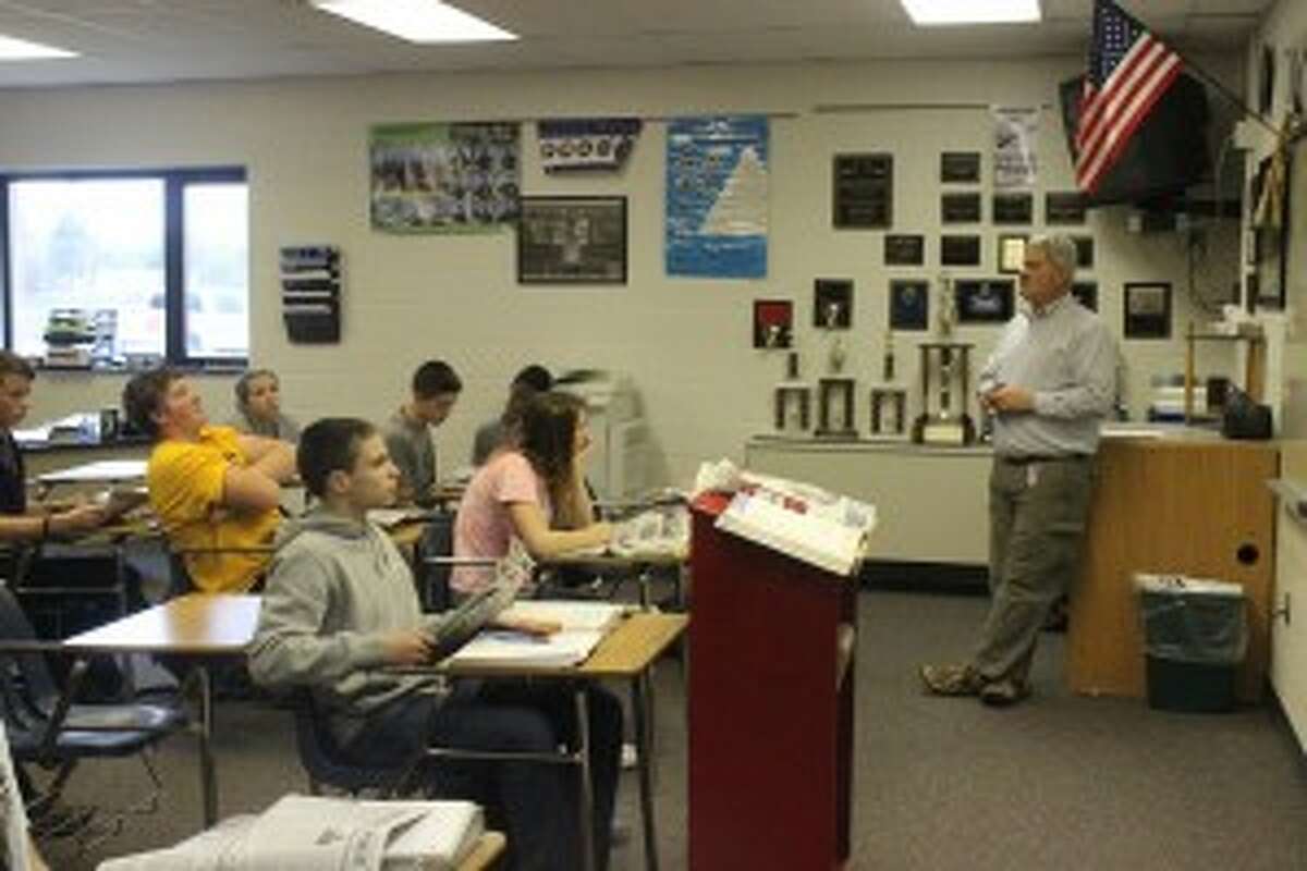 ELECTION NUMBERS: Frankfort teacher Mike Zimmerman leads his class during the Newspapers in Education program. During the lesson, students calculated and discussed the different numbers from the election results in the newspaper.