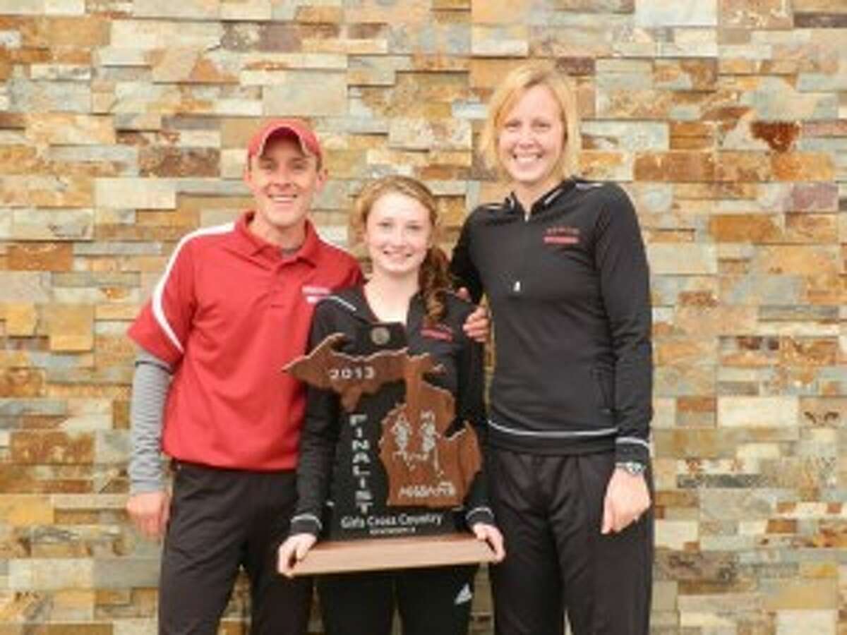 COACH OF THE YEAR: Benzie Cross Country head coach Asa Kelly, left, was awarded Coach of the Year in Michigan. (File Photo)