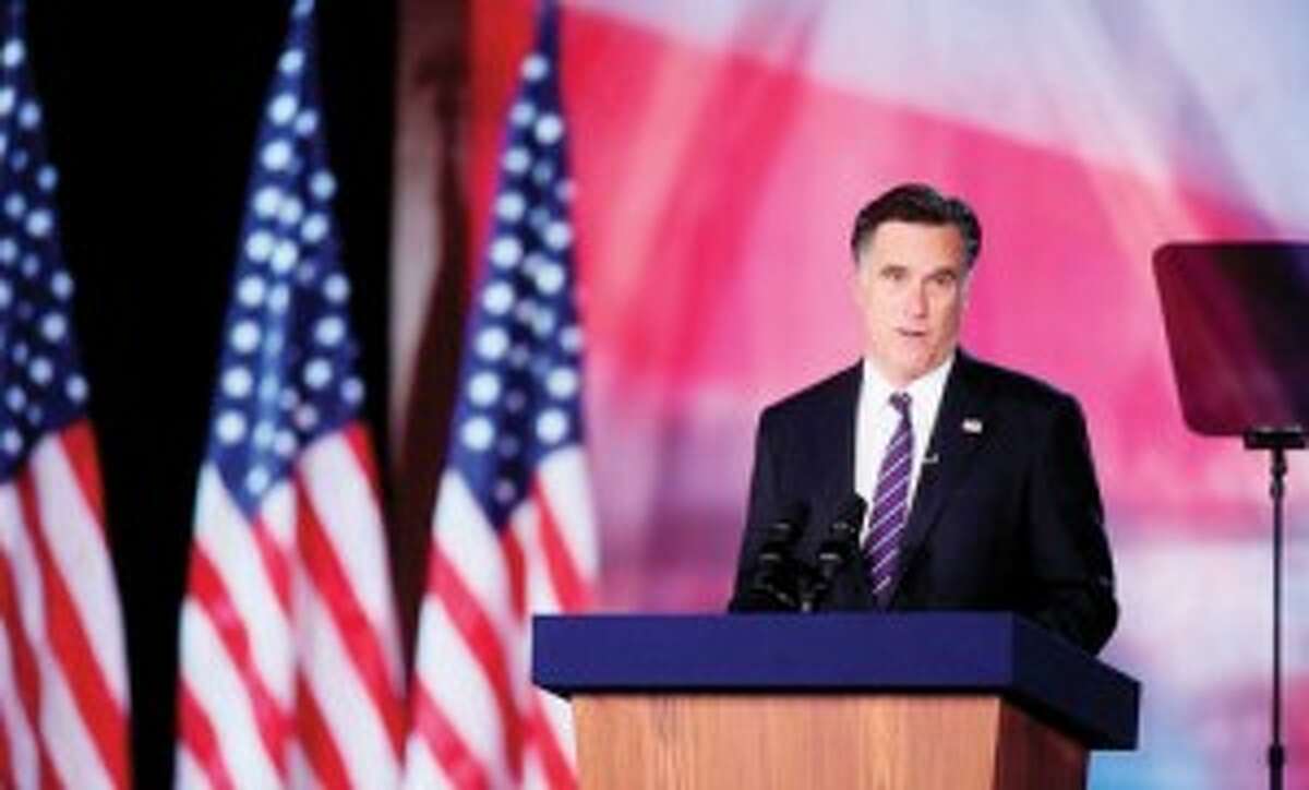 SECOND GUESSING: Gov. Mitt Romney concedes to President Barack Obama at the Boston Convention and Exhibition Center on Tuesday in Boston. (Courtesy photo)