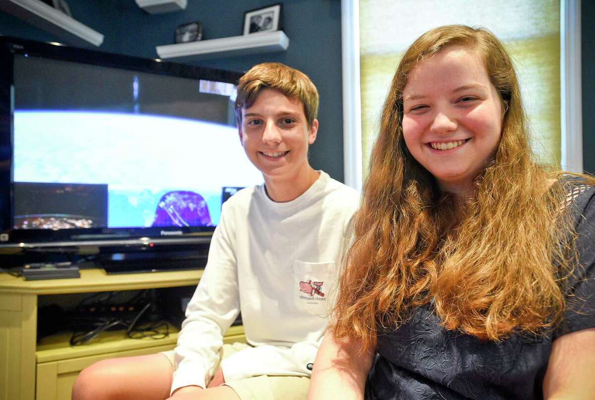 Academy of Information Technology and Engineering (AITE) students Kevin Fleischer and Anna Lichtenberg are photograph on Aug. 9, 2019 at Fleischer home in Stamford, Connecticut. Fleischer and Lichtenberg were among 13 selected NASA-sponsored high school students nationwide to participated in astronomical research at Caltech this summer.