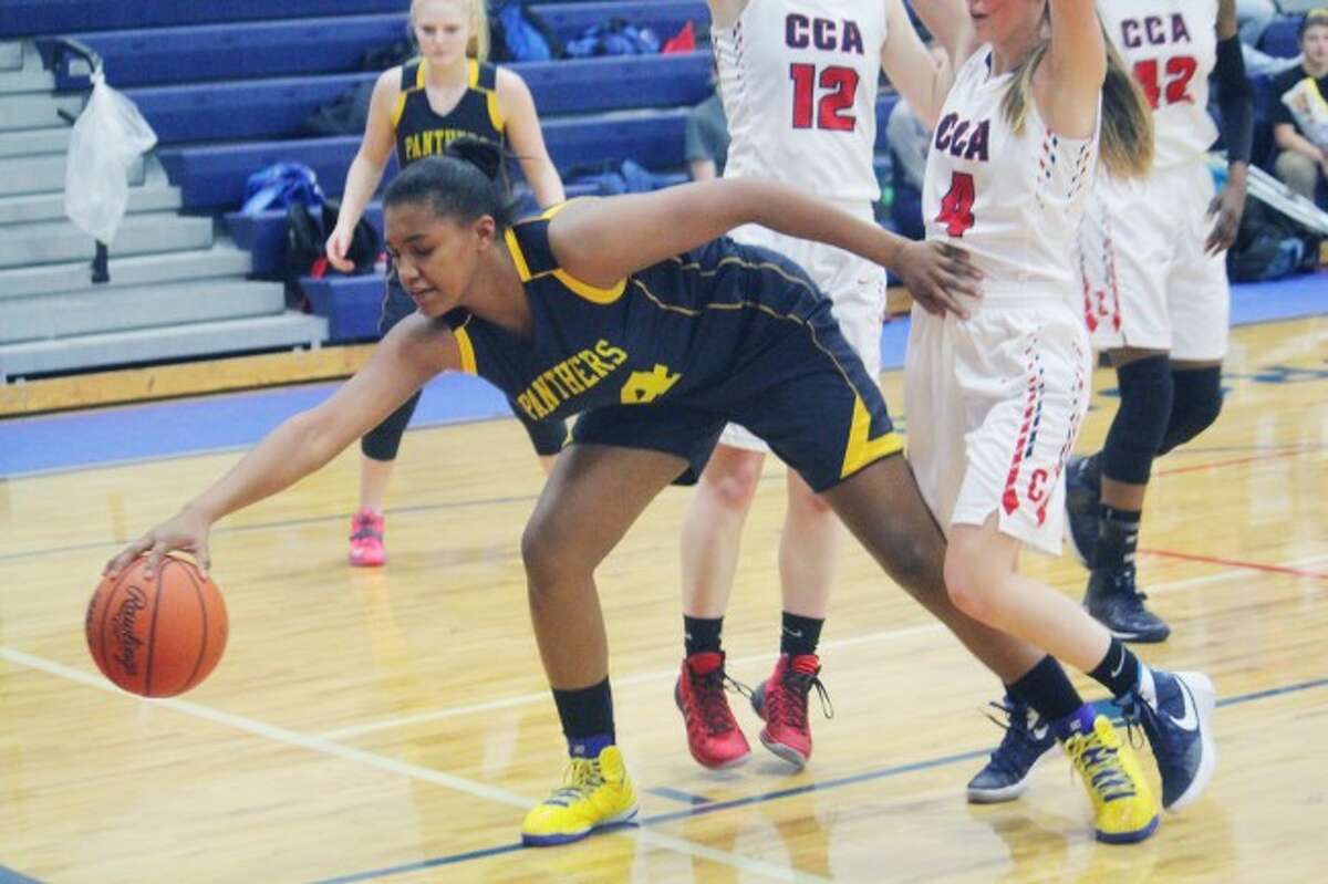 victory: Baldwin’s Amanyi Freeman tries to secure the ball in Thursday’s game at CCA. (Star photo/John Raffel)