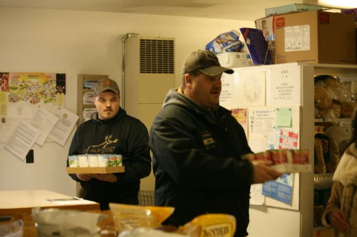 SPECIAL DELIVERY: On Feb. 20, the Baldwin Fire Department delivered dozens of boxes and crates of food to the Bread of Life Food Pantry, which is the latest effort in the department's support for the charitable organization.