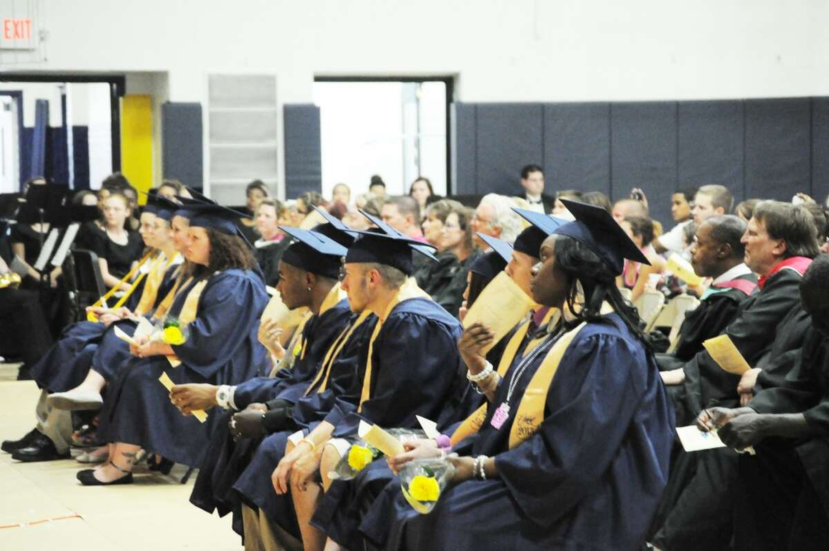 CLASS OF 2013: Sitting together in the front row of the Baldwin High School gym is the graduating Class of 2013. The commencement ceremony included speeches, a slide show and a rendition of the class song by a classmate. (Star photo/Kyle Leppek)