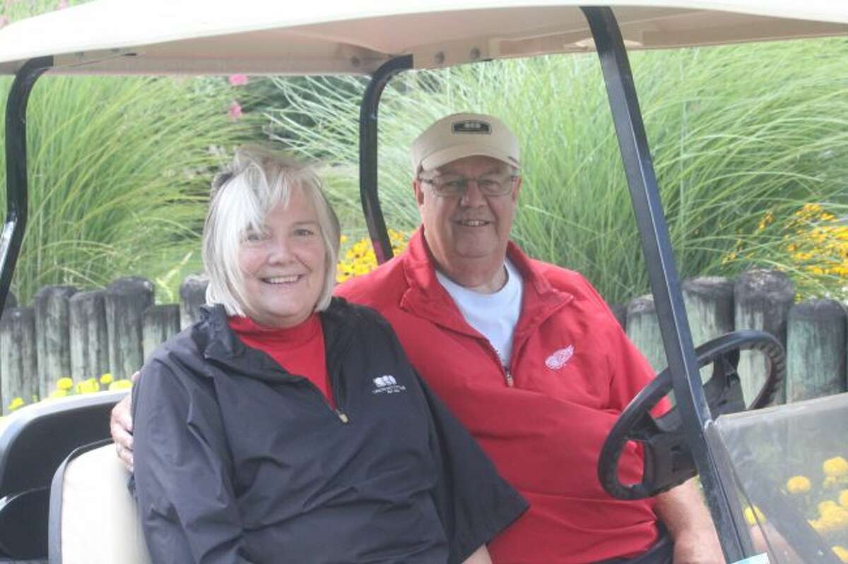 Tom and Pat Ackerberg are set for a round of golf.