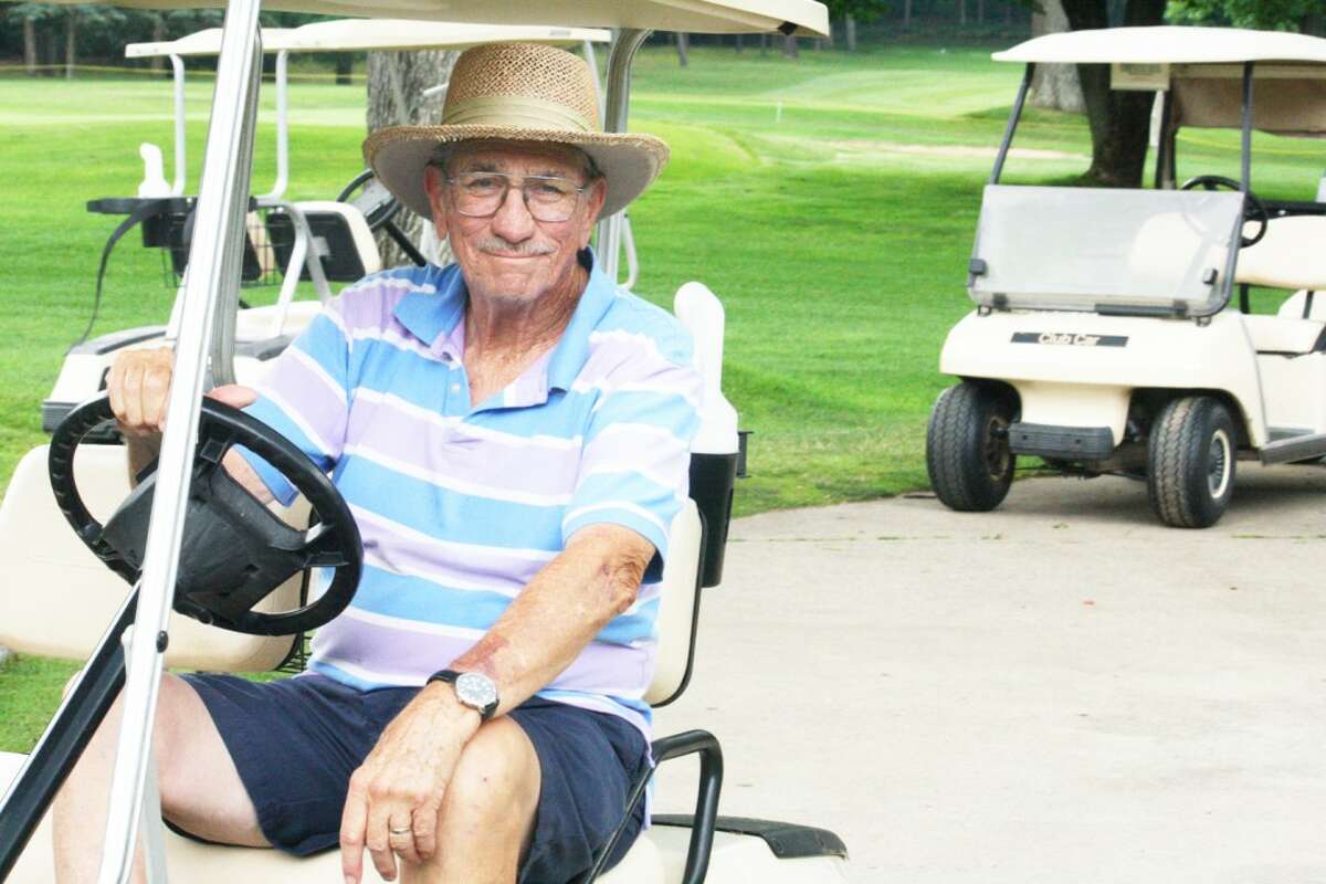 Golfer: Ross Broderick of Baldwin gets ready for a round of golf at Marquette Trails. (Star photo/John Raffel)