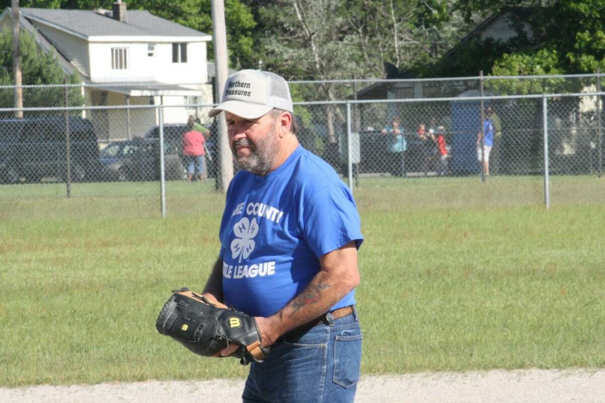 Practice: Baldwin Little League coach Bill Buckley works with his team during practice this season. (File photo)