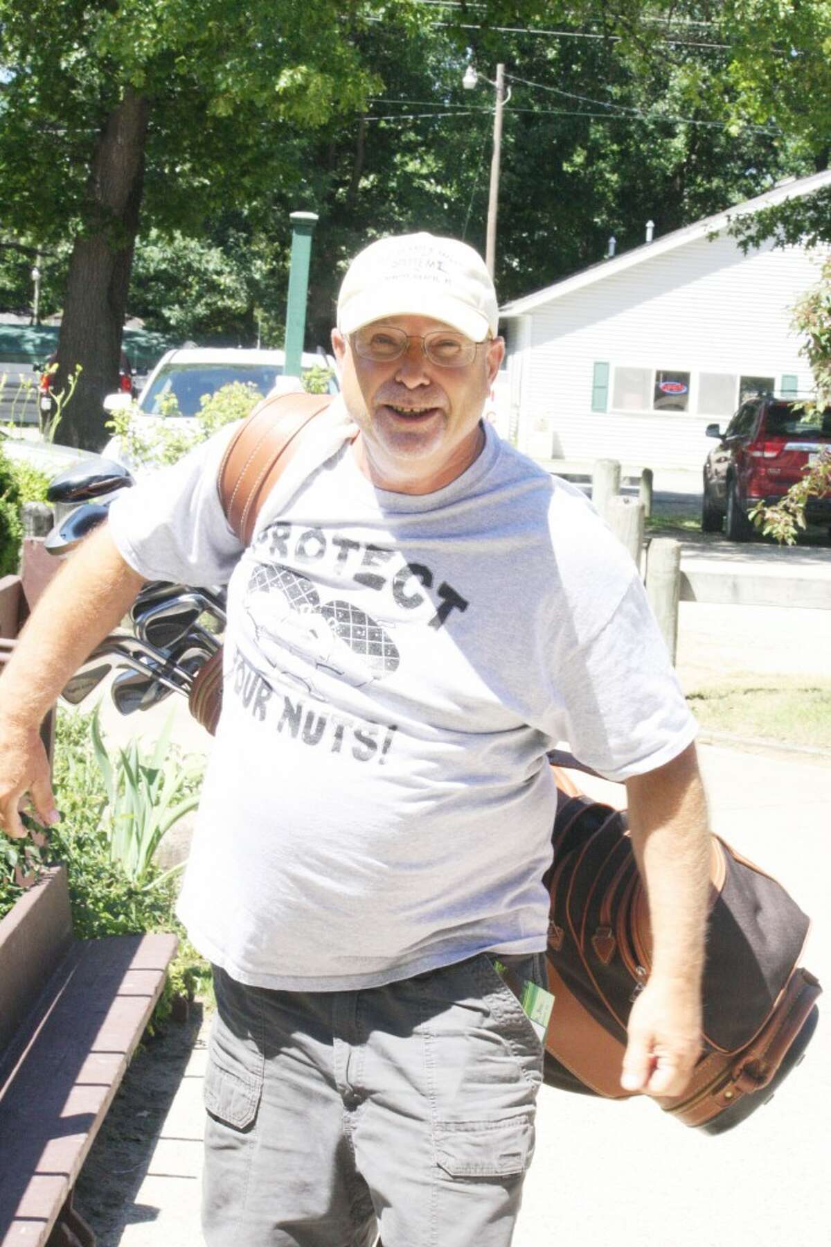 MARQUETTE: Arnie Morrison of Baldwin gets ready for another round of golf at Marquette Trails. (Star photo/John Raffel)