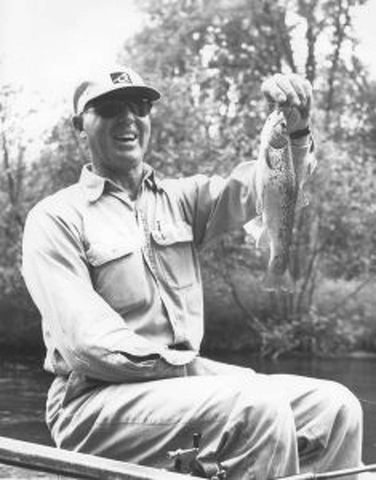 ON THE RIVER: Zimmy Nolph with a nice trout circa 1960.