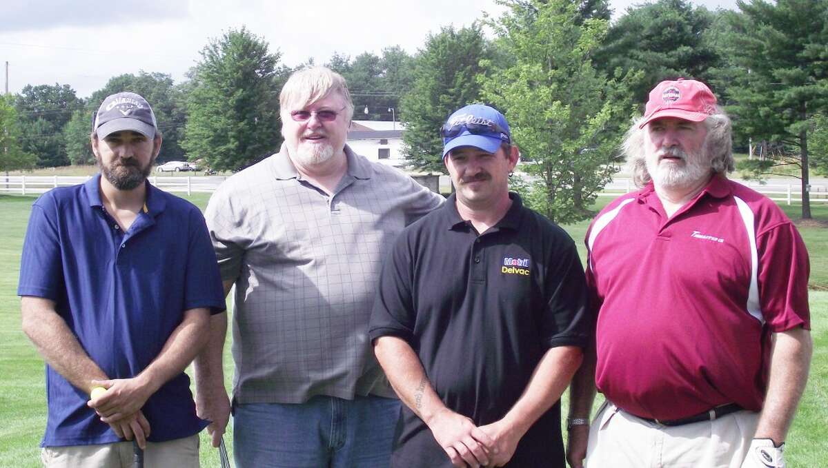 WINNERS: The Big “K” Construction team of (from left to right) John Larr, Kenner McKie, John Sobaski and Phil McKie were the winners of the 2013 Golf for Warmth event. (Courtesy photo)