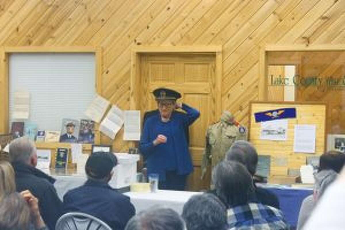 BALDWIN - Almost 50 people showed up to a presentation about the Robert Smith family, given by Debbie Oleson Smith, during the Lake County Historical Society meeting on Wednesday, Nov. 9, at the Baldwin Business Center. Tables of old photos and Smith family memorabilia were available for viewing along with military uniforms and artifacts collected from the service of Robert J. Smith in World War I and Robert S. Smith in World War II.Smith said her dad, Robert S. Smith, seldom talked about the things he went through during WWII. He was in China during the end of the war and traveled to Hong Kong. He even shook hands with the president of China, Chiang Kai-shek. Smith brought back ivory carvings and other interesting items from his travels in China. Smith compared the recent major election to elections back in older times. She recalled her dad giving people rides to the polls, even if they didn't vote the way he was voting. She said back then people weren't as likely to take other's votes or opinions so personally. People weren't looked down upon because of a different view. Smith said how her dad was proud of the diversity in Baldwin and all of his friends of different ethnic, racial and religious backgrounds who he learned so much from. She finished the presentation with a brief history of the Lake Osceola State Bank. Originally starting in Baldwin, when the bank merged with Luther, and then a branch in Tustin in 1963, the name came to be the Lake Osceola State bank. Of the 108 years of service to the Baldwin community, the bank stayed in the Smith family, starting with her grandfather Robert J. Smith; her father Robert S. Smith; her uncle Curtis L. Smith and now herself serving as president. As the program closed, Jill Engelmen, curator of the Lake County Historical Museum, publicly thanked the Smith family for...