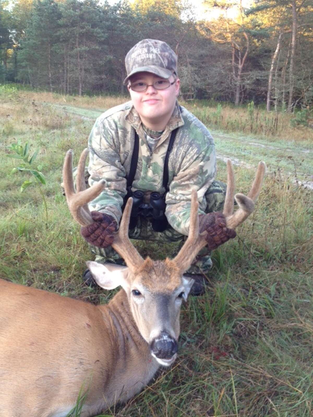 Bradley Hall of Sand Lake was among the participants who were able to fulfill a dream recently at the Legends Ranch in Bitely during the annual Special Youth Challenge Hunt. Hall shot an eight-point buck at the ranch on Aug. 23. (Pioneer photo/John Raffel)