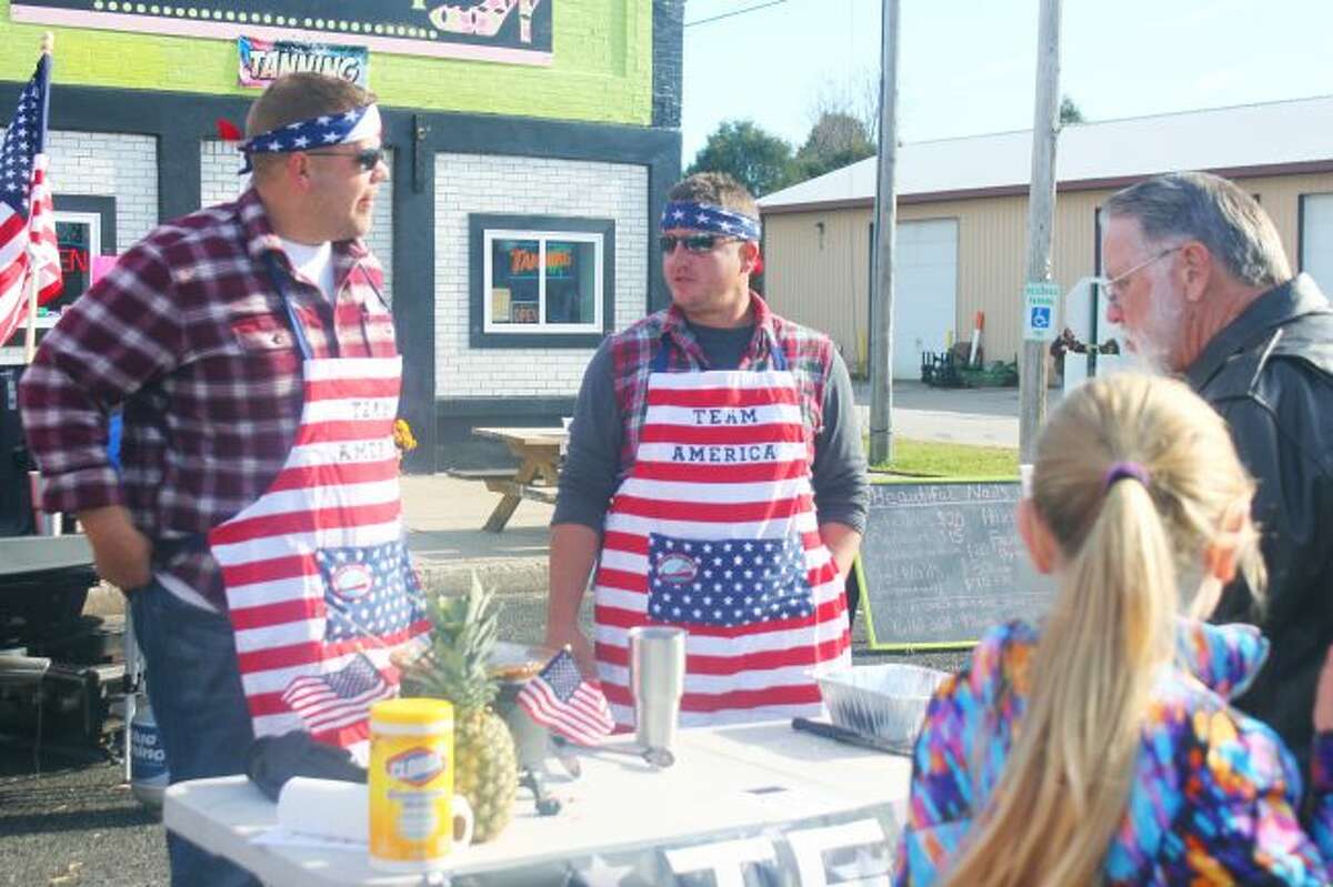 WINNERS: Travis Kuipers and Josh Williams won both the chili contest and best use for theme "Pure Luther" with their Team America chili. (Lake County Star photo/Shanna Avery) Use which one you think best!