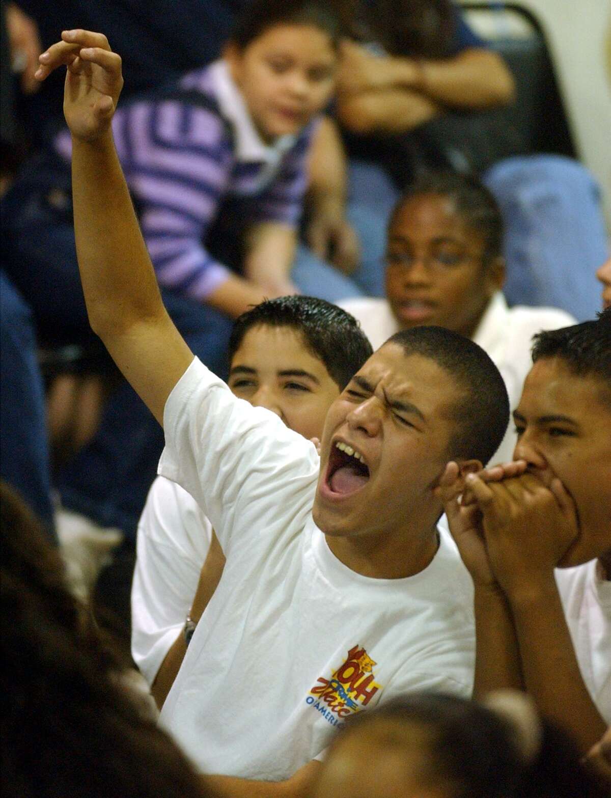 In recent years, the United Way of San Antonio has focused its efforts on education, family support and safety net initiatives. Here, students participate in a anti-drug initiative sponsored by the United Way.