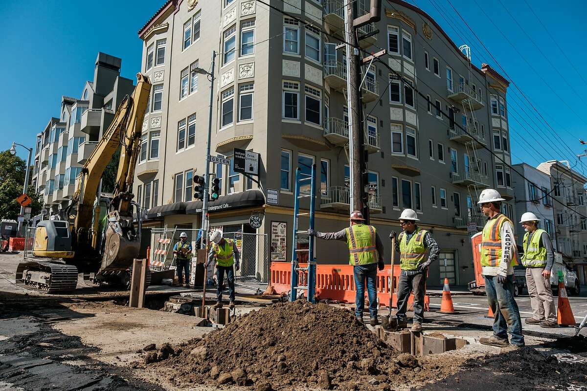 August 16, 2019 - Construction crews can be seen working on the corner of Van Ness and Green. Muni says it's learned some lessons in the first phase of the Van Ness Ave project, and it's taking a new approach to construction that should speed things up and finish the street work by 2021. Merchants and residents have their doubts.