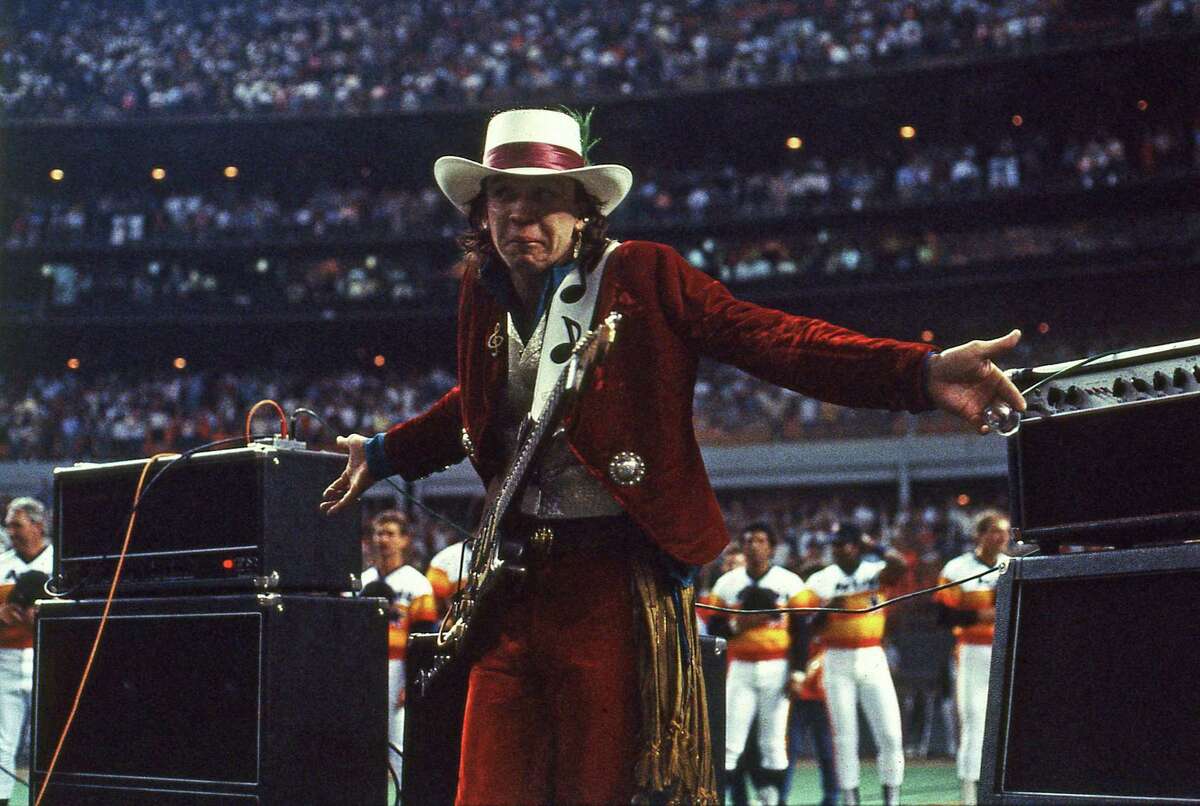 Musician Stevie Ray Vaughan following his performance of the national anthem on his guitar, April 9, 1985, at the Astrodome.