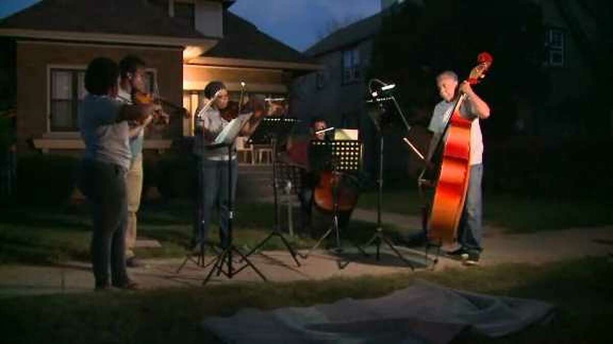 WATCH: Group of musicians plays songs at crime scenes to help communities  heal