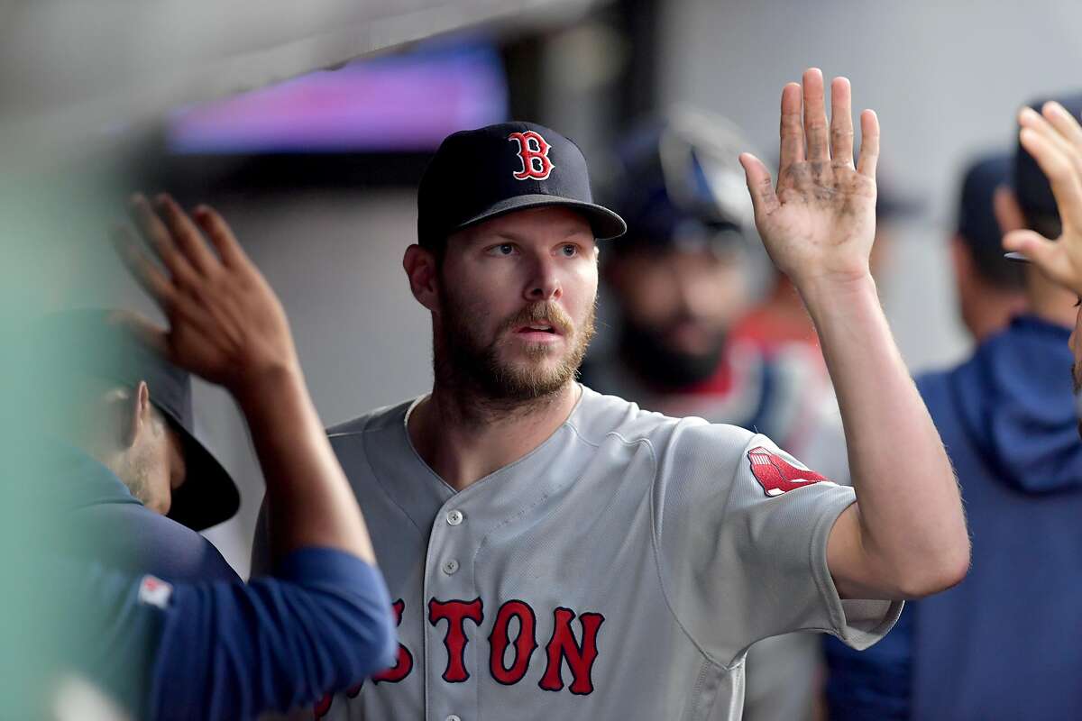 CORRECTED VERSION - CLEVELAND, OHIO - AUGUST 13: Starting pitcher Chris Sale #41 of the Boston Red Sox celebrates after throwing his 2,000th career strike out to end the third inning against the Cleveland Indians at Progressive Field on August 13, 2019 in Cleveland, Ohio. (Photo by Jason Miller/Getty Images)