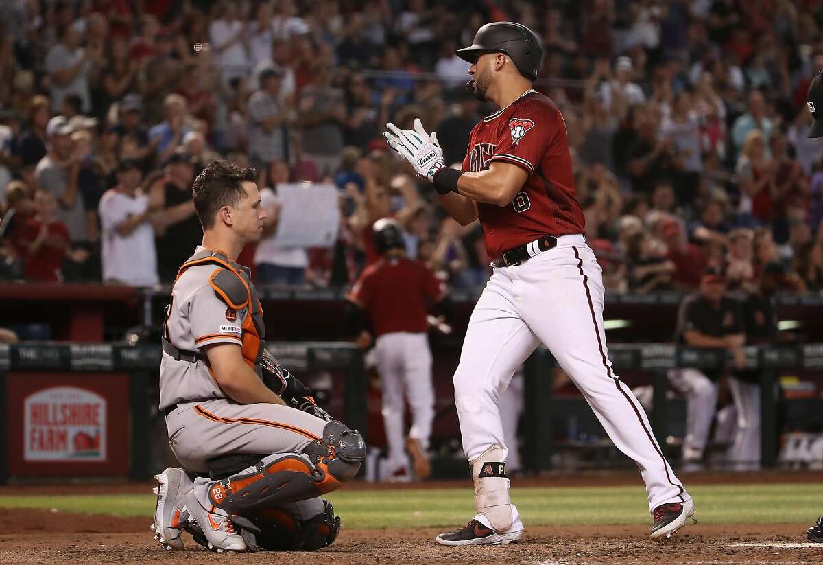 David Peralta and Brandon Crawford by Christian Petersen