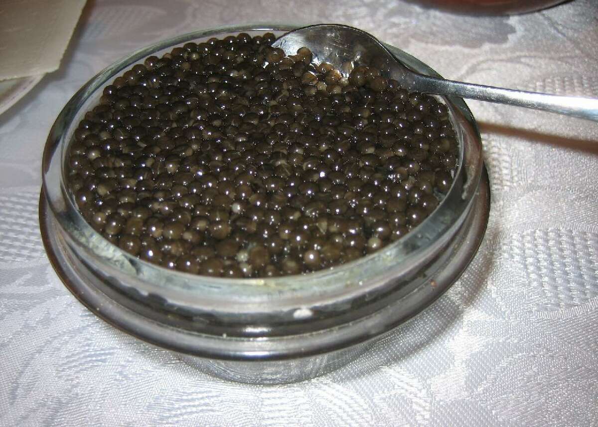 Beluga caviar Until 2005, the United States consumed 60% of the world’s beluga caviar, a delicacy long associated with high-end luxury cuisine. The fish-egg aristocratic favorite does not come from the beluga whale, which is a mammal, but the beluga sturgeon. In 2005, The New York Times reported that the United States Fish and Wildlife Service had banned the import of beluga products from the countries in the Caspian Sea region that export it because they didn’t comply with safeguards for the fish, which has been threatened with extinction due to overfishing. This slideshow was first published on theStacker.com