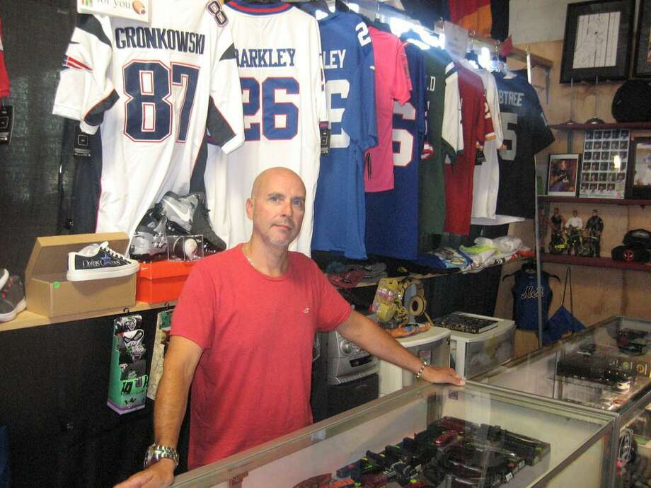 Vendor Jesse Spaar in his space at the New Brunswick Indoor Flea Market in Torrington. Photo: John Torsiello /