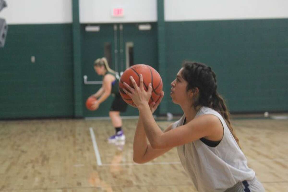 Anselma Barnett works on her free-throw shooting.