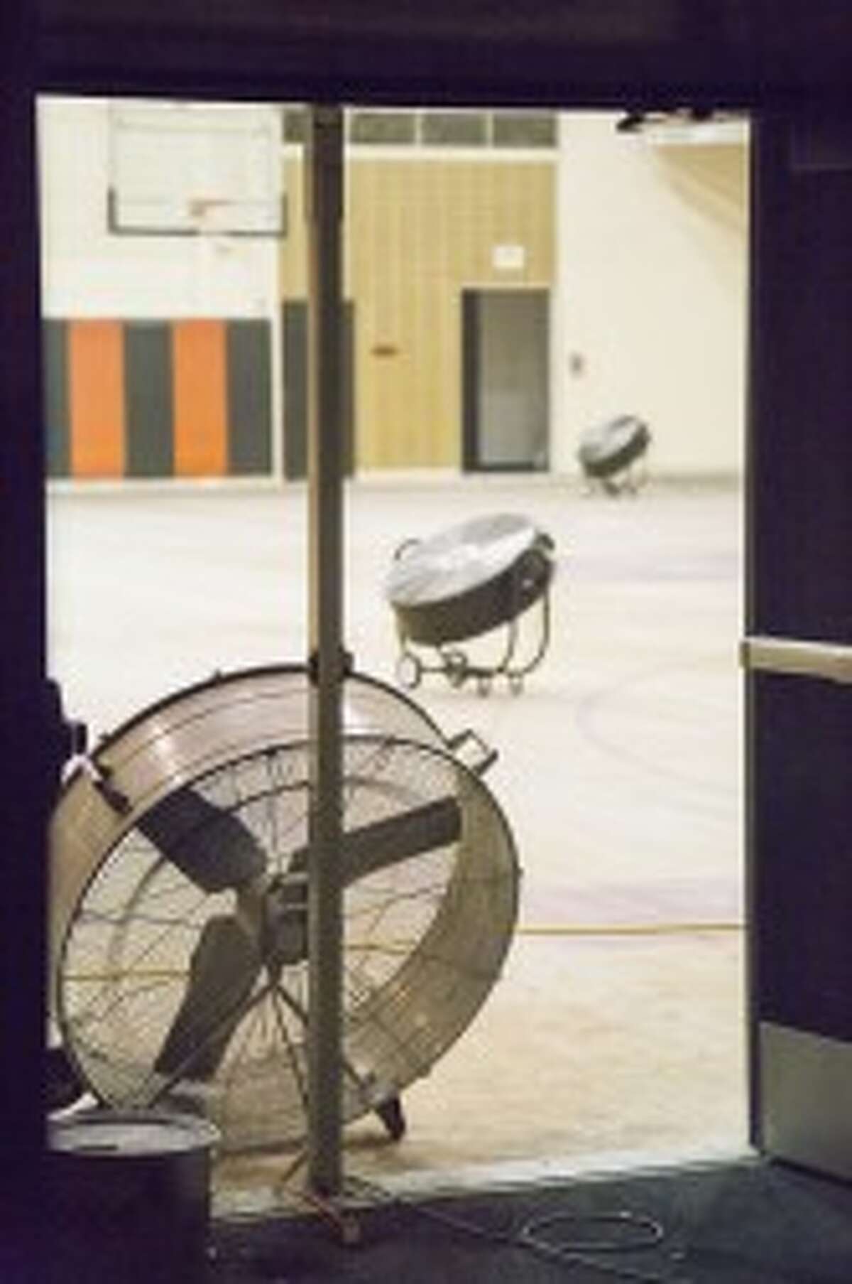 Clearing the Smoke: Large fans were used the night of the fire to help clear smoke from the gym and hopefully limit the damage it caused.