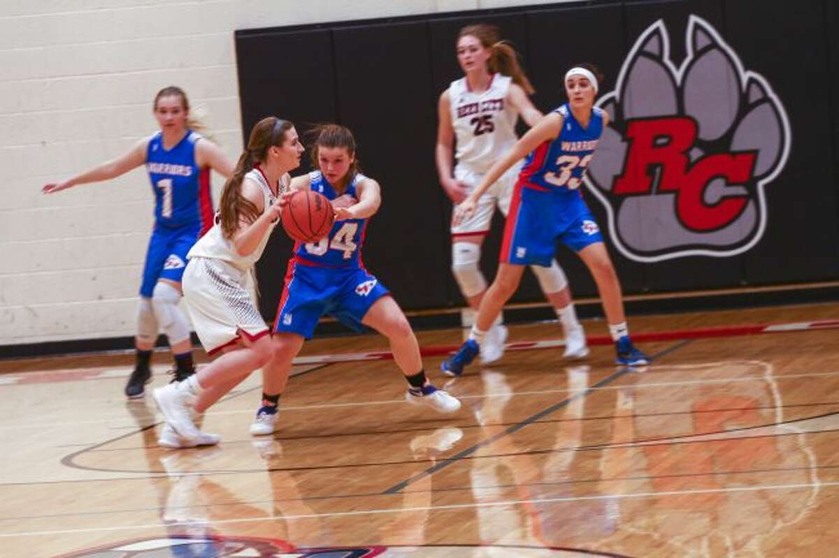Emily Libey drives to the basket.