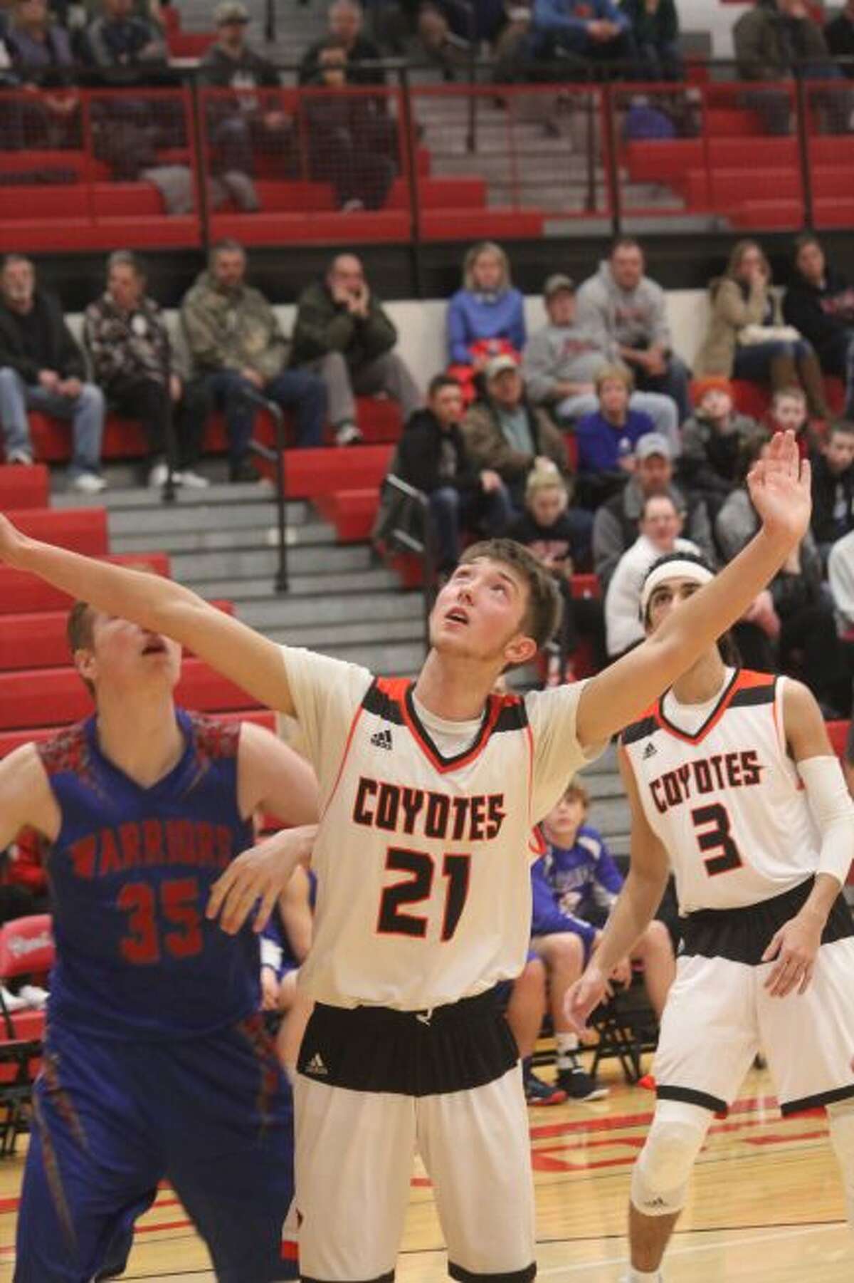 Cody Kailing (21) waits for a possible rebound.