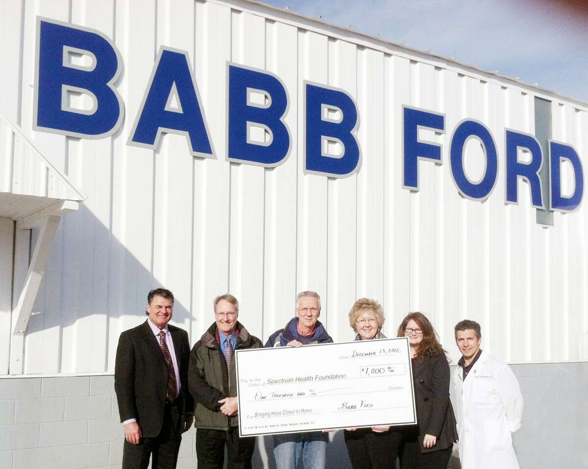 Donation: Pictured left to right: Bob Horan - General Manager, Babb Ford, Sam Daugherty- president, Spectrum Health Reed City Hospital, Ron Babb - owner, Babb Ford, Sue Snavley - marketing/public relations manager, Christie Carlson, development director and Dr.Tom Campana, chief of staff - Spectrum Health Reed City Hospital. (Courtesy photo)