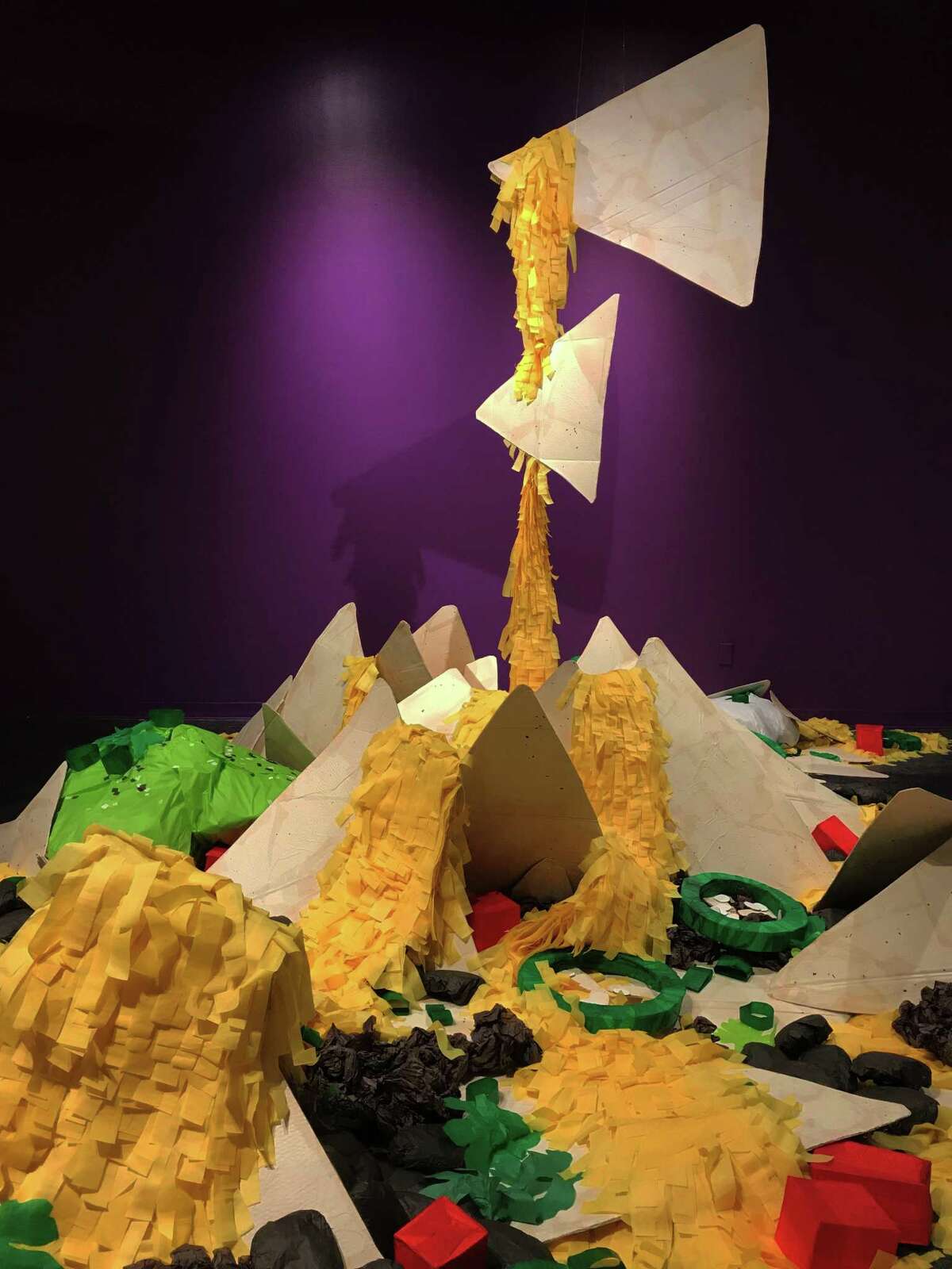 "Floor Nachos Supreme" is the largest of the pinata-inspired sculptures in Justin Favela's solo show "All You Can Eat," on view through Sept. 1 at Houston Center for Contemmporary Craft.