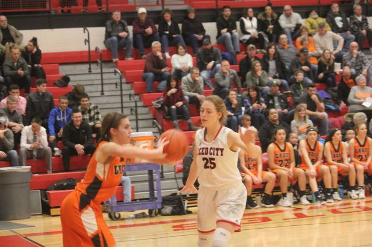 Alison Duddles tries to stop the inbounds.