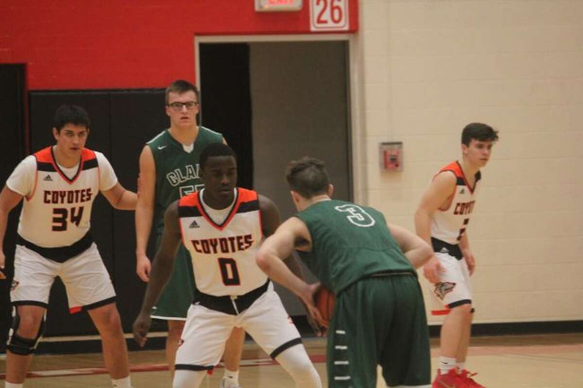 Phillip Jones (0) focuses on defense.