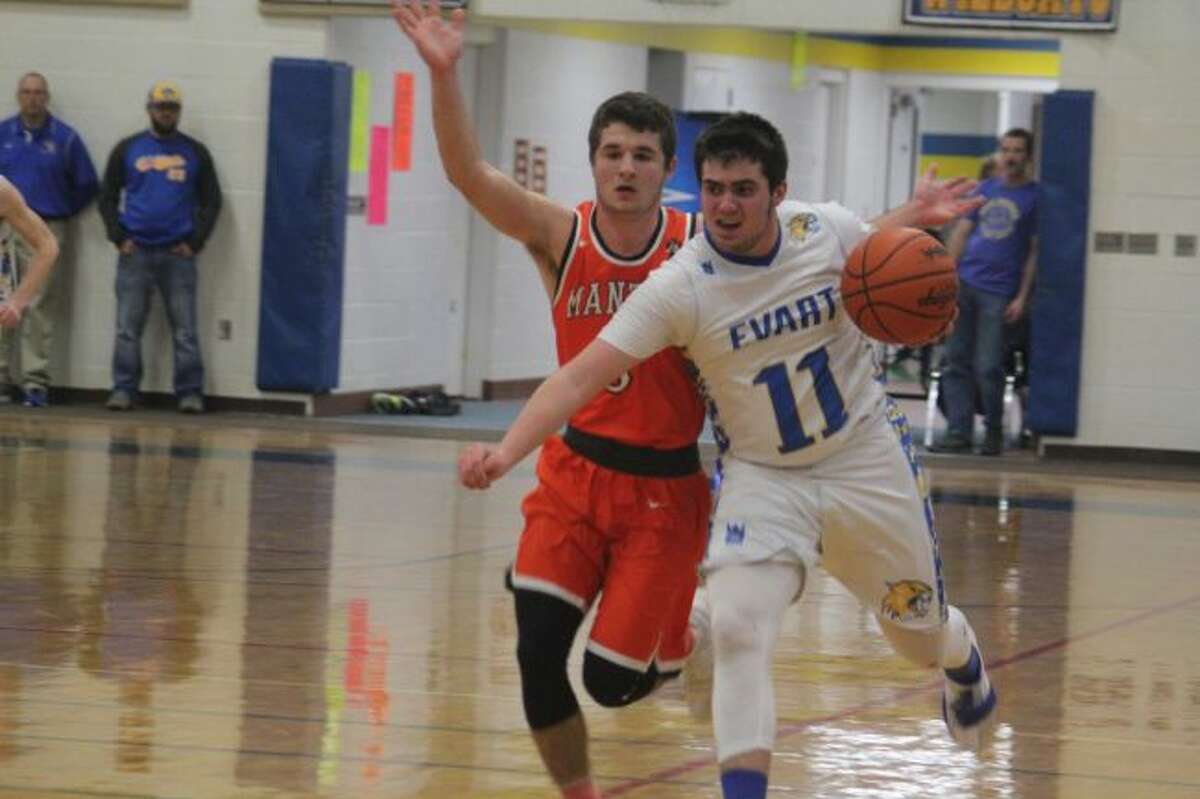 Cam Martin works with the ball for Evart.