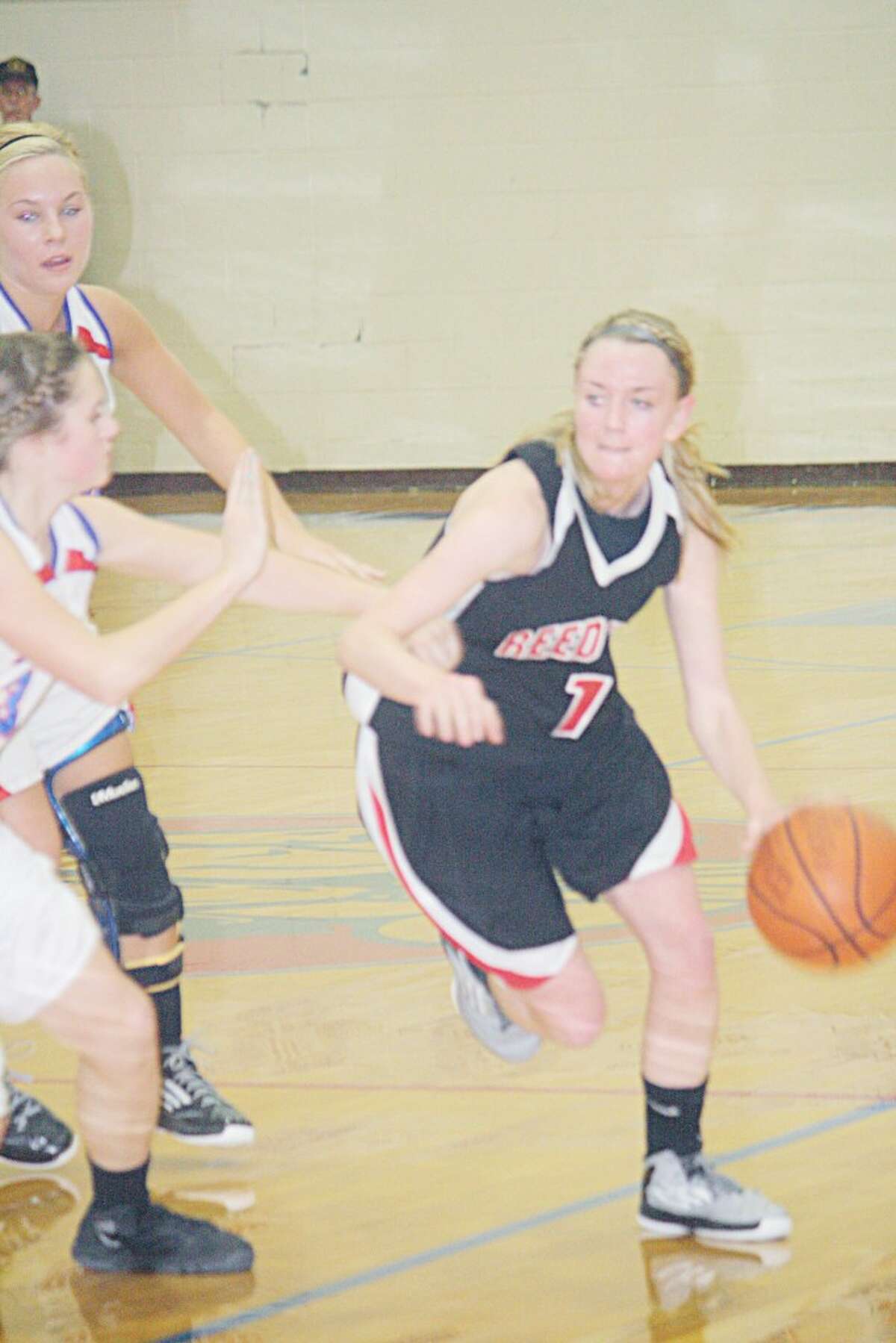 Rematch pressure: Emma Lockhart drives to the basket for Reed City in recent action. (Herald review/John Raffel)
