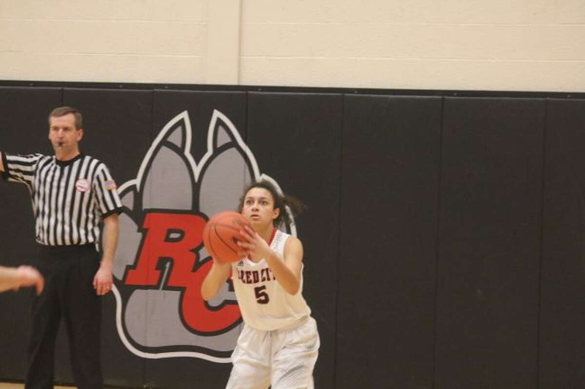 Reed City's Kiera Barker takes a shot in recent actiom.